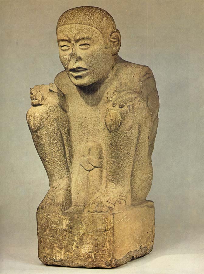 Staff with Seated figure